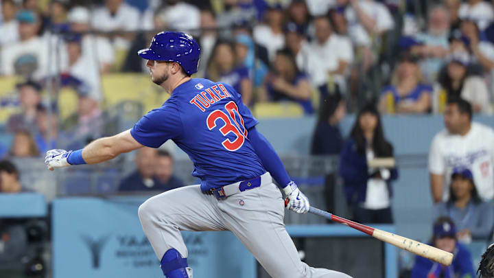 Chicago Cubs outfielder Kyle Tucker (30) doubles during the fourth inning against the Los Angeles Dodgers at Dodger Stadium on April 11.
