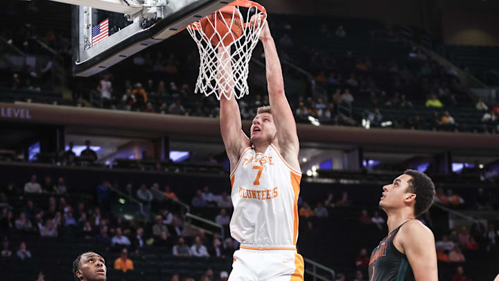Dec 10, 2024; New York, New York, USA; Tennessee Volunteers forward Igor Milicic Jr. (7) dunks in the first half against the Miami Hurricanes at Madison Square Garden. Mandatory Credit: Wendell Cruz-Imagn Images Dec 10, 2024; New York, New York, USA; Tennessee Volunteers forward Igor Milicic Jr. (7) dunks in the first half against the Miami Hurricanes at Madison Square Garden. Mandatory Credit: Wendell Cruz-Imagn Images