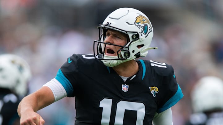 Nov 10, 2024; Jacksonville, Florida, USA; Jacksonville Jaguars quarterback Mac Jones (10) celebrates his touchdown against the Minnesota Vikings in the first quarter at EverBank Stadium. Mandatory Credit: Jeremy Reper-Imagn Images