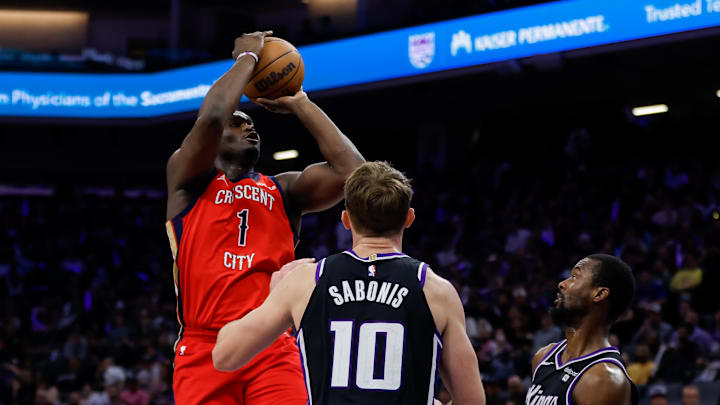 Apr 2, 2024; Sacramento, California, USA; New Orleans Pelicans forward Zion Williamson (1) shoots the ball against Sacramento Kings forward Harrison Barnes (40) during the third quarter at Golden 1 Center. Mandatory Credit: Sergio Estrada-Imagn Images
