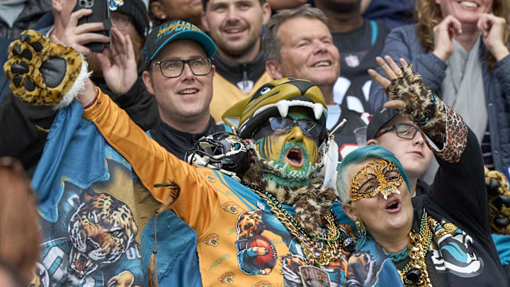 Oct 20, 2024; London, United Kingdom; Fans celebrate in the second half between the New England Patriots and Jacksonville Jaguars during an NFL International Series game at Wembley Stadium. Mandatory Credit: Peter van den Berg-Imagn Images