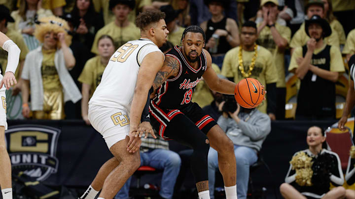 Houston graduate forward J'Wan Roberts (right)