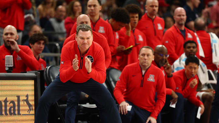 Dec 14, 2024; Phoenix, Arizona, USA; Arizona Wildcats head coach Tommy Lloyd against the UCLA Bruins in the second half at Footprint Center. Mandatory Credit: Mark J. Rebilas-Imagn Images