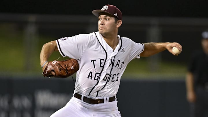 Jun 10, 2022; College Station, TX, USA; Texas A&M pitcher Jacob Palisch (33) delivers the pitch in the top of the during the eighth inning of the super regional against the Louisville Mandatory Credit: Maria Lysaker-Imagn Images