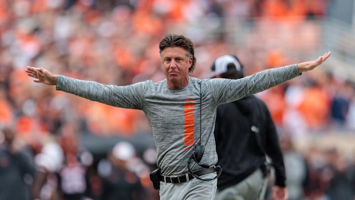 Nov 2, 2024; Stillwater, Oklahoma, USA; Oklahoma State Cowboys coach Mike Gundy reacts after a call during the second quarter against the Arizona State Sun Devils at Boone Pickens Stadium. Mandatory Credit: William Purnell-Imagn Images Nov 2, 2024; Stillwater, Oklahoma, USA; Oklahoma State Cowboys coach Mike Gundy reacts after a call during the second quarter against the Arizona State Sun Devils at Boone Pickens Stadium. Mandatory Credit: William Purnell-Imagn Images