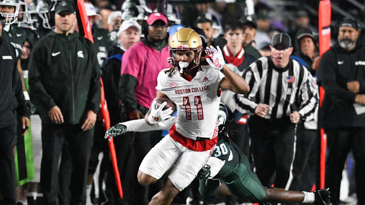 Sep 21, 2024; Chestnut Hill, Massachusetts, USA; Boston College Eagles wide receiver Lewis Bond (11) runs the ball against the Michigan State Spartans during the second half at Alumni Stadium. Mandatory Credit: Eric Canha-Imagn Images Sep 21, 2024; Chestnut Hill, Massachusetts, USA; Boston College Eagles wide receiver Lewis Bond (11) runs the ball against the Michigan State Spartans during the second half at Alumni Stadium. Mandatory Credit: Eric Canha-Imagn Images