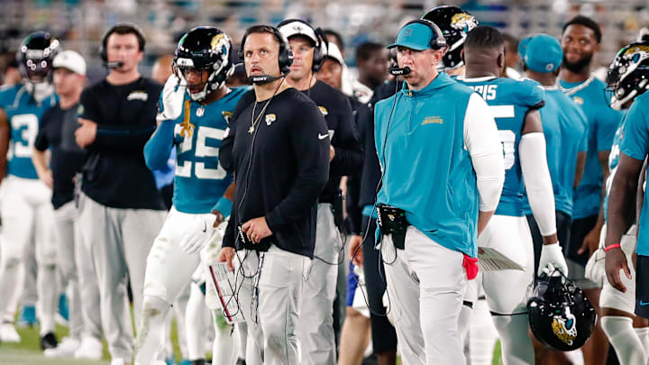 Aug 9, 2025; Jacksonville, Florida, USA; Jacksonville Jaguars defensive coordinator Anthony Campanile stands with head coach Liam Coen on the sidelines during a preseason game against the Pittsburgh Steelers at EverBank Stadium. Mandatory Credit: Travis Register-Imagn Images Aug 9, 2025; Jacksonville, Florida, USA; Jacksonville Jaguars defensive coordinator Anthony Campanile stands with head coach Liam Coen on the sidelines during a preseason game against the Pittsburgh Steelers at EverBank Stadium. Mandatory Credit: Travis Register-Imagn Images