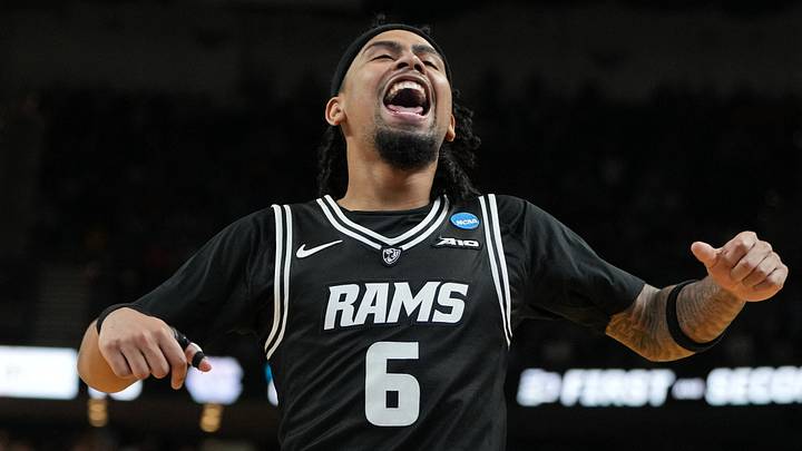 Mar 19, 2026; Greenville, SC, USA; VCU Rams guard Terrence Hill Jr. (6) celebrates after defeating the North Carolina Tar Heels in overtime of a first round game of the men's 2026 NCAA Tournament at Bon Secours Wellness Arena. Mandatory Credit: Bob Donnan-Imagn Images
