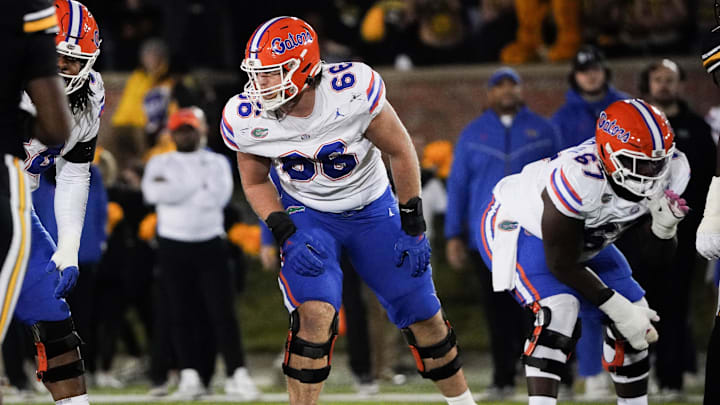 Nov 18, 2023; Columbia, Missouri, USA; Florida Gators offensive lineman Jake Slaughter (66) at the line of scrimmage against the Missouri Tigers during the game at Faurot Field at Memorial Stadium. Mandatory Credit: Denny Medley-Imagn Images