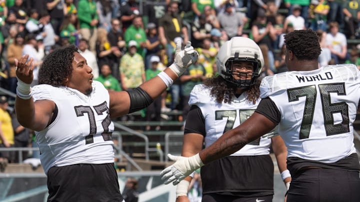 Oregon’s Iapani Laloulu, left, Lipe Moala and Isaiah World dance to the song “Shout” during the Oregon Spring Game at Autzen in Eugene April 26, 2025. Oregon’s Iapani Laloulu, left, Lipe Moala and Isaiah World dance to the song “Shout” during the Oregon Spring Game at Autzen in Eugene April 26, 2025.