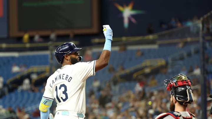 Tampa Bay Rays third baseman Junior Caminero (13) celebrates after hitting a home run against the Boston Red Sox  during the fourth inning at Tropicana Field in 2024.