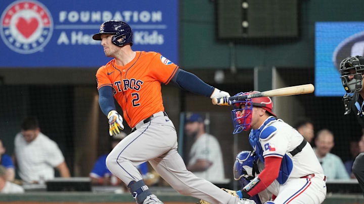 Apr 8, 2024; Arlington, Texas, USA; Houston Astros third baseman Alex Bregman (2) hits a RBI single