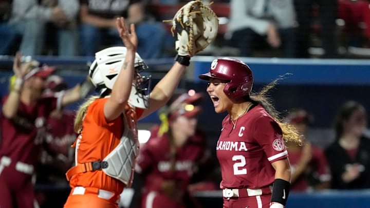 Oklahoma's Nelly McEnroe-Marinas (2) runs home to score a run to run rule Oklahoma State in the fifth inning a college Bedlam softball game between the University of Oklahoma Sooners (OU) and the Oklahoma State University Cowgirls (OSU) at Devon Park in Oklahoma City, Wednesday, April 9, 2025.