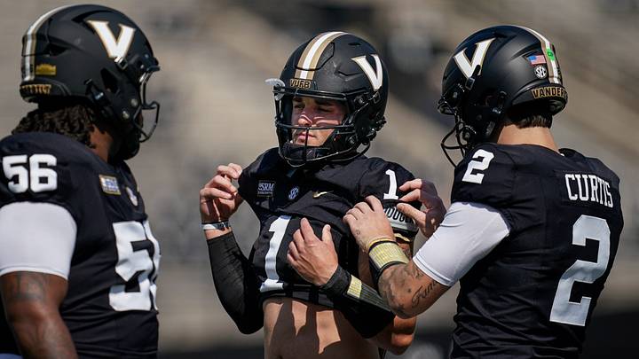 Vanderbilt quarterback Blaze Berlowitz (1) and quarterback Jared Curtis (2) gets ready for warmups before a game against NC State at FirstBank Stadium in Nashville, Tenn., Saturday, Sept. 19, 2026. Vanderbilt quarterback Blaze Berlowitz (1) and quarterback Jared Curtis (2) gets ready for warmups before a game against NC State at FirstBank Stadium in Nashville, Tenn., Saturday, Sept. 19, 2026.