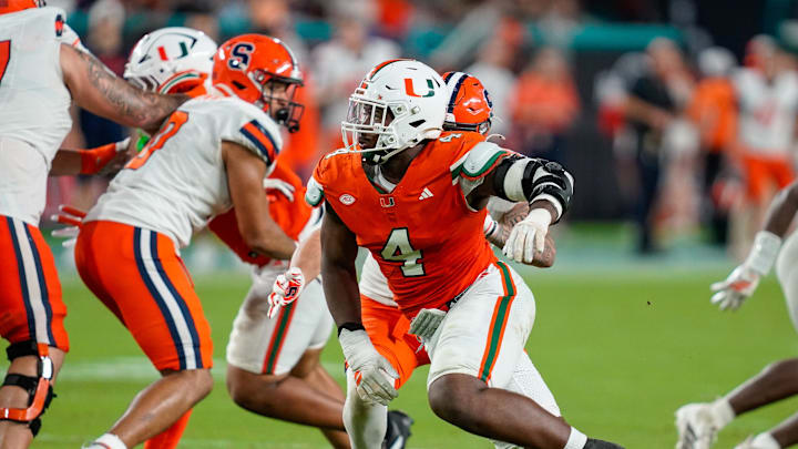 Nov 8, 2025; Miami Gardens, Florida, USA; Miami Hurricanes defensive lineman Rueben Bain Jr. (4) rushes the passer against the Syracuse Orange during the third quarter at Hard Rock Stadium. Mandatory Credit: Jeff Romance-Imagn Images