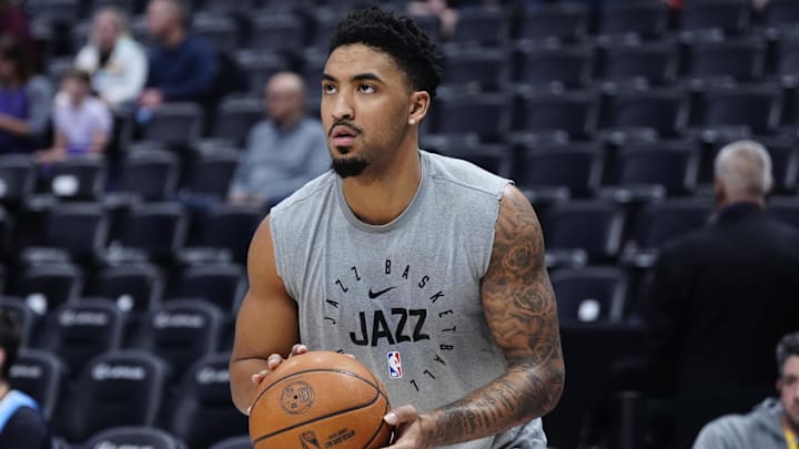 Mar 28, 2025; Denver, Colorado, USA; Utah Jazz forward KJ Martin (99) warms up before the game at Ball Arena. Mandatory Credit: Ron Chenoy-Imagn Images