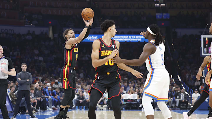 Oct 27, 2024; Oklahoma City, Oklahoma, USA; Atlanta Hawks guard Trae Young (11) shoots a three point basket against the Oklahoma City Thunder during the first quarter at Paycom Center. Mandatory Credit: Alonzo Adams-Imagn Images