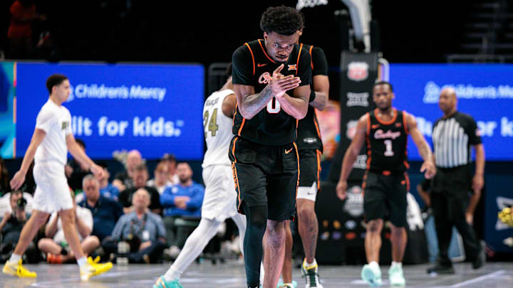 Mar 10, 2026; Kansas City, MO, USA; Oklahoma State Cowboys guard Jaylen Curry (0) reacts at the end of the game against the Colorado Buffaloes at T-Mobile Center. Mandatory Credit: William Purnell-Imagn Images