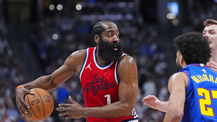 May 3, 2025; Denver, Colorado, USA; LA Clippers guard James Harden (1) prepares to pass the ball in the second quarter against the Denver Nuggets during game seven of first round for the 2025 NBA Playoffs at Ball Arena. Mandatory Credit: Ron Chenoy-Imagn Images