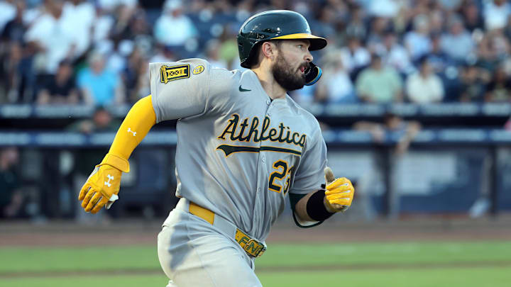 Jul 1, 2025; St. Petersburg, Florida, USA; Athletics catcher Shea Langeliers (23) doubles during the fourth inning against the Tampa Bay Rays at George M. Steinbrenner Field. Mandatory Credit: Kim Klement Neitzel-Imagn Images