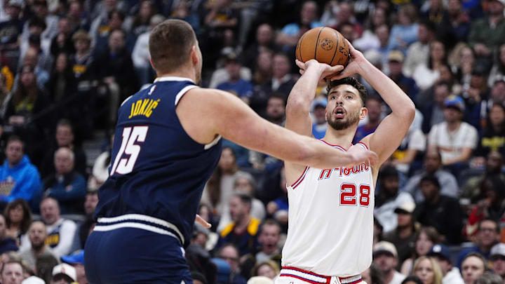 Dec 15, 2025; Denver, Colorado, USA; Houston Rockets center Alperen Sengun (28) shoots the ball over Denver Nuggets center Nikola Jokic (15) n the first quarter at Ball Arena. Mandatory Credit: Ron Chenoy-Imagn Images Dec 15, 2025; Denver, Colorado, USA; Houston Rockets center Alperen Sengun (28) shoots the ball over Denver Nuggets center Nikola Jokic (15) n the first quarter at Ball Arena. Mandatory Credit: Ron Chenoy-Imagn Images