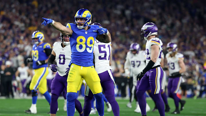 Jan 13, 2025; Glendale, AZ, USA; Los Angeles Rams tight end Tyler Higbee (89) reacts after a catch against the Minnesota Vikings during the first half in an NFC wild card game at State Farm Stadium. Mandatory Credit: Mark J. Rebilas-Imagn Images