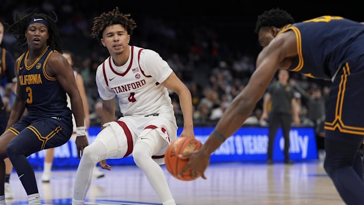 Mar 12, 2025; Charlotte, NC, USA; Stanford Cardinal guard Oziyah Sellers (4) reacts to losing the ball going to the basket against the California Golden Bears during the second half at Spectrum Center. Mandatory Credit: Jim Dedmon-Imagn Images