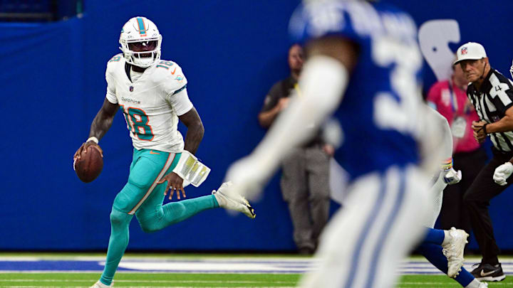 Miami Dolphins quarterback Tyler Huntley (18) looks for an open teammate during the second half against the Indianapolis Colts at Lucas Oil Stadium.