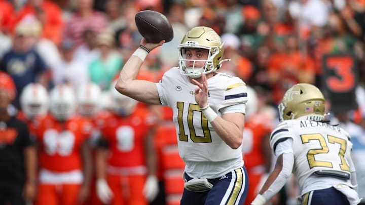 Nov 9, 2024; Atlanta, Georgia, USA; Georgia Tech Yellow Jackets quarterback Haynes King (10) throws a pass against the Miami Hurricanes in the second quarter at Bobby Dodd Stadium at Hyundai Field. Mandatory Credit: Brett Davis-Imagn Images