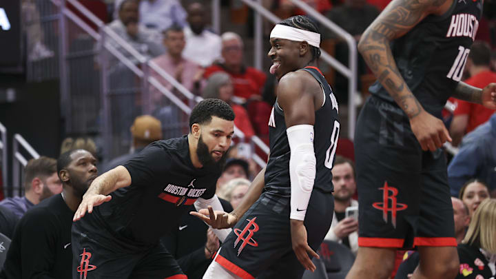 Nov 15, 2024; Houston, Texas, USA; Houston Rockets guard Aaron Holiday (0) reacts with guard Fred VanVleet (5) after making a basket during the fourth quarter against the Los Angeles Clippers at Toyota Center. Mandatory Credit: Troy Taormina-Imagn Images Nov 15, 2024; Houston, Texas, USA; Houston Rockets guard Aaron Holiday (0) reacts with guard Fred VanVleet (5) after making a basket during the fourth quarter against the Los Angeles Clippers at Toyota Center. Mandatory Credit: Troy Taormina-Imagn Images