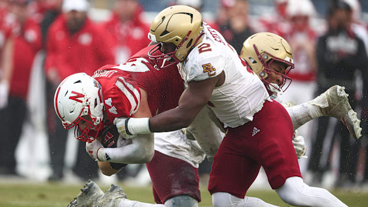 Dec 28, 2024; Bronx, NY, USA; Nebraska Cornhuskers tight end Luke Lindenmeyer (44) is tackled by Boston College Eagles linebacker Bryce Steele (2) during the first half at Yankee Stadium. Mandatory Credit: Vincent Carchietta-Imagn Images Dec 28, 2024; Bronx, NY, USA; Nebraska Cornhuskers tight end Luke Lindenmeyer (44) is tackled by Boston College Eagles linebacker Bryce Steele (2) during the first half at Yankee Stadium. Mandatory Credit: Vincent Carchietta-Imagn Images