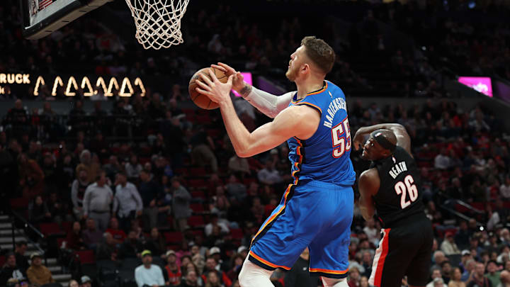 Nov 5, 2025; Portland, Oregon, USA;  Oklahoma City Thunder center/forward Isaiah Hartenstein (55) makes a last second shot in the first half against the Portland Trail Blazers at Moda Center. Mandatory Credit: Jaime Valdez-Imagn Images

