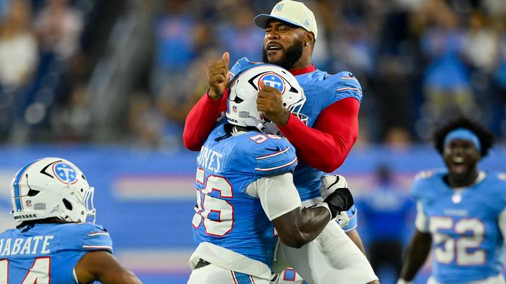 Aug 23, 2026; Nashville, Tennessee, USA;  Tennessee Titans defensive tackle Jeffery Simmons (98) celebrates the sack from linebacker Truman Jones (56) against the Seattle Seahawks during the second half at Nissan Stadium.  Mandatory Credit: Steve Roberts-Imagn Images