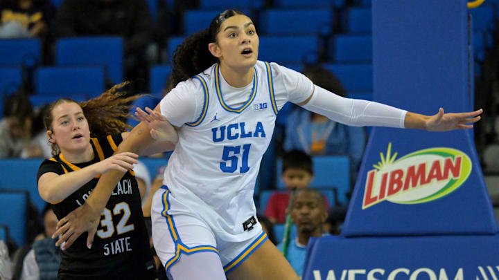 Dec 20, 2025; Los Angeles, California, USA; UCLA Bruins center Lauren Betts (51) boxes out Long Beach State Beach guard Brynna Pukis (32) under the basket during the second half at Pauley Pavilion presented by Wescom Financial. Mandatory Credit: Jayne Kamin-Oncea-Imagn Images