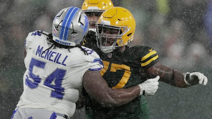 Green Bay Packers offensive tackle Jordan Morgan (77) blocks Detroit Lions defensive tackle Alim McNeill (54).