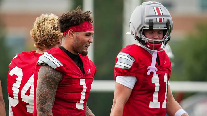 Ohio State Buckeyes wide receiver Brandon Inniss (1) talks to wide receiver Brock Boyd (11) during the first practice of training camp at the Woody Hayes Athletic Center in Columbus on Aug. 6, 2026. Ohio State Buckeyes wide receiver Brandon Inniss (1) talks to wide receiver Brock Boyd (11) during the first practice of training camp at the Woody Hayes Athletic Center in Columbus on Aug. 6, 2026.