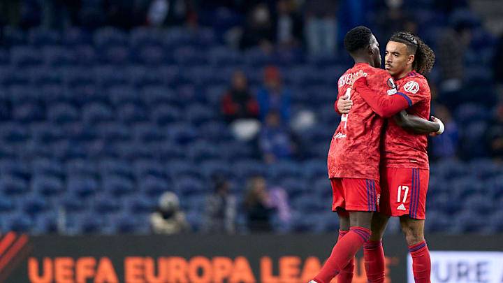 Les deux joueurs sous le maillot de l'OL