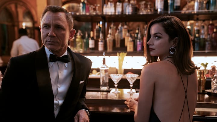 James Bond (Daniel Craig) and Paloma (Ana de Armas) in NO TIME TO DIE, an EON Productions and Metro-Goldwyn-Mayer Studios film.