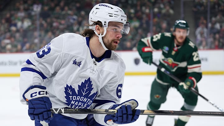 Mar 15, 2026; Saint Paul, Minnesota, USA; Toronto Maple Leafs forward Matias Maccelli skates for the puck against the Minnesota Wild at Grand Casino Arena. Mandatory Credit: Matt Krohn-Imagn Images