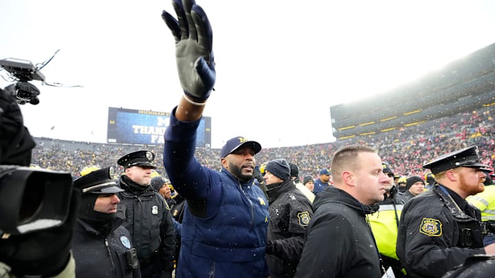 Michigan Wolverines head coach Sherrone Moore tells his players to get back following the NCAA football game against the Ohio State Buckeyes at Michigan Stadium in Ann Arbor, Mich. on Nov. 29, 2025. Ohio State won 27-9. Michigan Wolverines head coach Sherrone Moore tells his players to get back following the NCAA football game against the Ohio State Buckeyes at Michigan Stadium in Ann Arbor, Mich. on Nov. 29, 2025. Ohio State won 27-9.