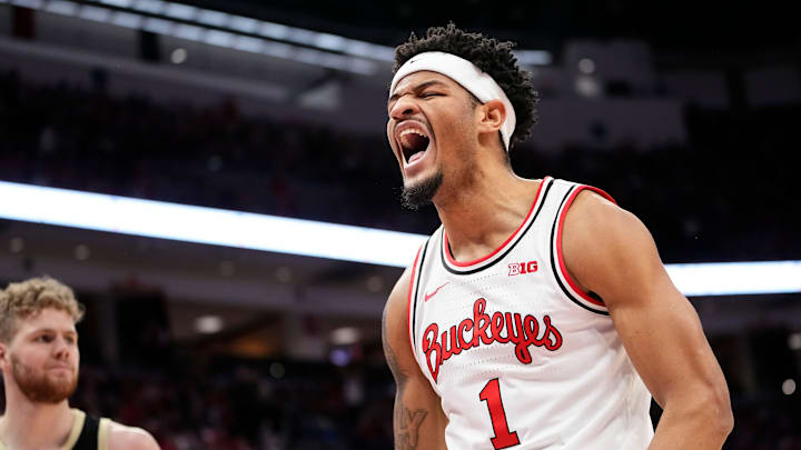 Feb 18, 2024; Columbus, Ohio, USA; Ohio State Buckeyes guard Roddy Gayle Jr. (1) reacts to a dunk