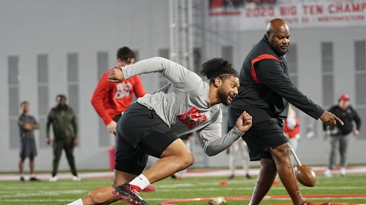 Mar 20, 2024; Columbus, Ohio, USA; Ohio State Buckeyes defensive end JT Tuimoloau runs a drill
