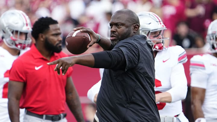 Sep 2, 2023; Bloomington, Indiana, USA; Ohio State Buckeyes running backs coach Tony Alford throws