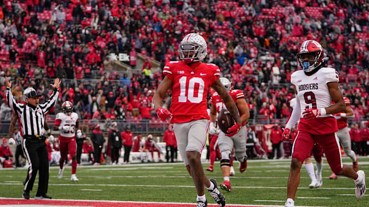 Nov 12, 2022; Columbus, Ohio, USA; Ohio State Buckeyes wide receiver Xavier Johnson (10) scores a