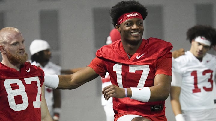 Mar 7, 2024; Columbus, OH, USA; Ohio State Buckeyes wide receiver Carnell Tate (17) stretches with wide receiver Reis Stocksdale (87) during spring football practice at the Woody Hayes Athletic Center.