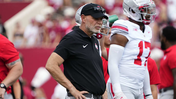 Sep 2, 2023; Bloomington, Indiana, USA; Ohio State Buckeyes defensive coordinator Jim Knowles watches warm ups prior to the NCAA football game at Indiana University Memorial Stadium. Ohio State won 23-3.