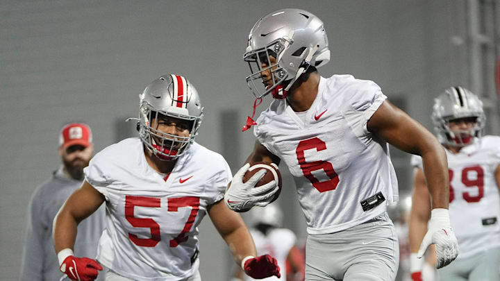 Mar 7, 2024; Columbus, OH, USA; Ohio State Buckeyes safety Sonny Styles (6) runs past linebacker Jalen Pace (57) during spring football practice at the Woody Hayes Athletic Center.