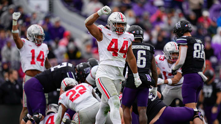Nov 5, 2022; Evanston, Illinois, USA; Ohio State Buckeyes defensive end J.T. Tuimoloau (44) celebrates a stop during the second half of the NCAA football game against the Northwestern Wildcats at Ryan Field. Ohio State won 21-7. Mandatory Credit: Adam Cairns-The Columbus Dispatch

Ncaa Football Ohio State Buckeyes At Northwestern Wildcats