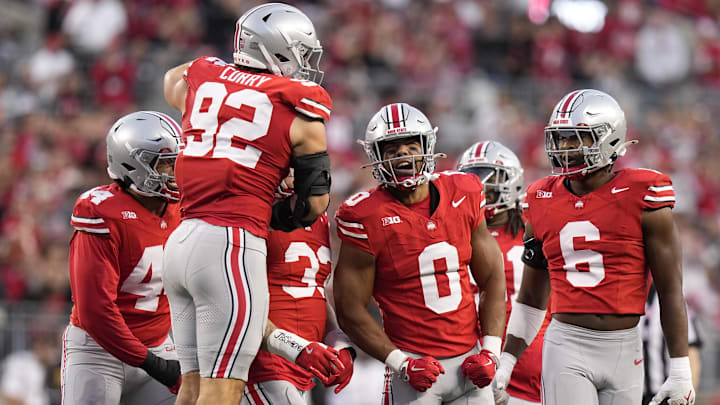Sep 7, 2024; Columbus, Ohio, USA;  Ohio State Buckeyes linebacker Cody Simon (0) celebrates with teammates after a sack against the Western Michigan Broncos during the first half at Ohio Stadium. Mandatory Credit: Adam Cairns-Imagn Images