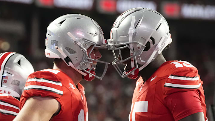 Sep 7, 2024; Columbus, Ohio, USA;  Ohio State Buckeyes quarterback Will Howard (18) celebrates with tight end Jelani Thurman (15) scoring a touchdown against the Western Michigan Broncos during the first half at Ohio Stadium. Mandatory Credit: Adam Cairns-Imagn Images